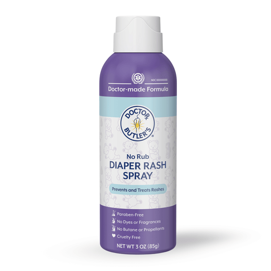 A bottle of Doctor Butler's No-Rub Diaper Rash Spray with purple and white labeling, indicating that it is a doctor-made formula and is free from dyes and fragrances.