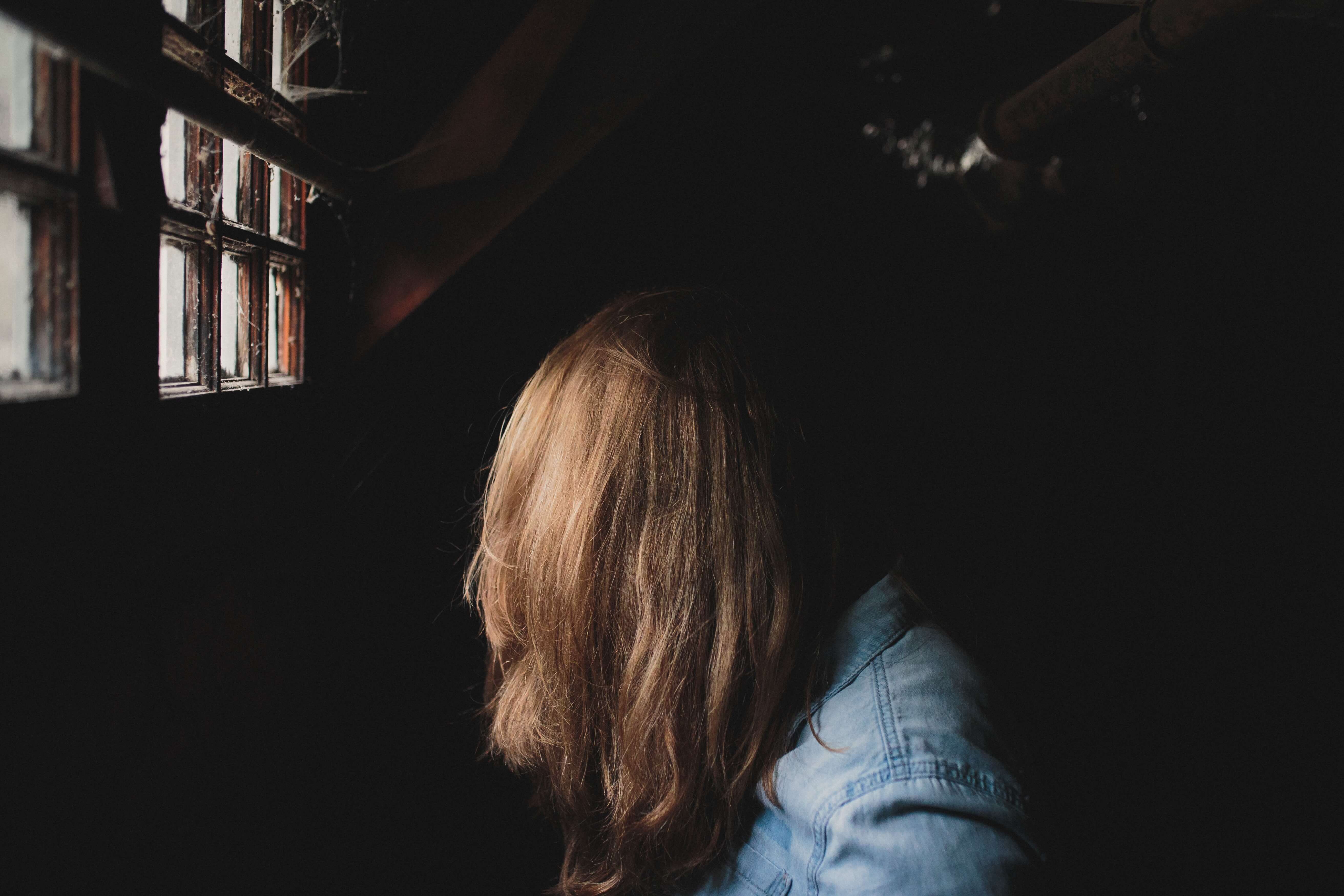 Women Sitting in Pain